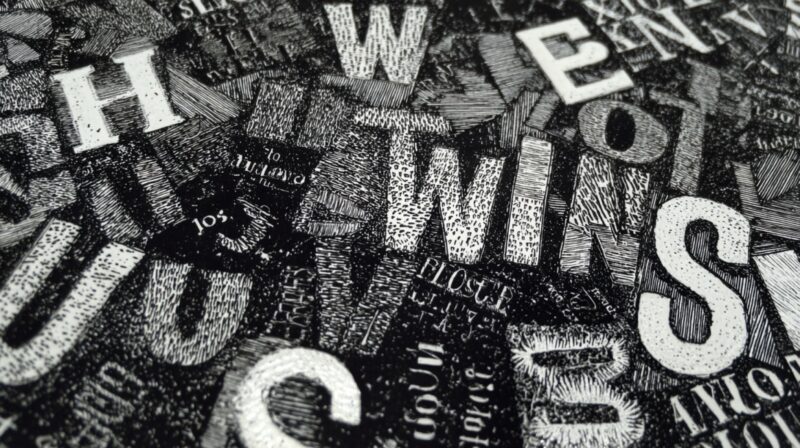 Artistic black-and-white collage of overlapping words and letters, symbolizing Shakespeare’s contribution to the English language